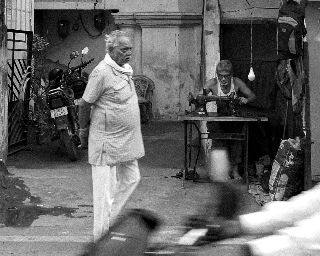 Tailor working on traditional wear alterations